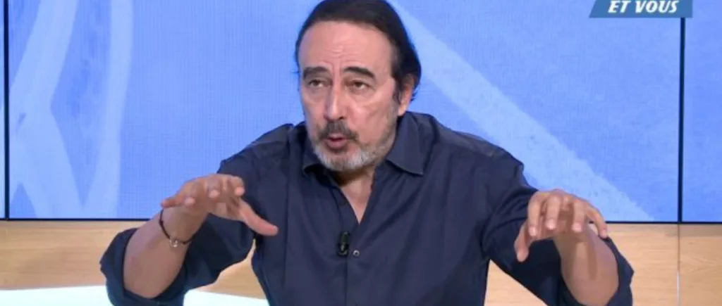 Didier Roustan sur le plateau de l'Equipe TV